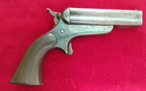 A scarce American 4 barrelled .32 rimfire Derringer made by Sharps. Circa 1859. Ref 2638